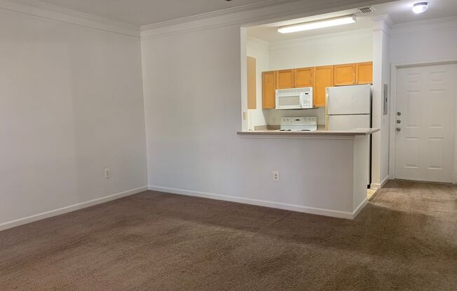 1/1 Ground Floor Unit with attached Garage!  Mirabella Condominiums