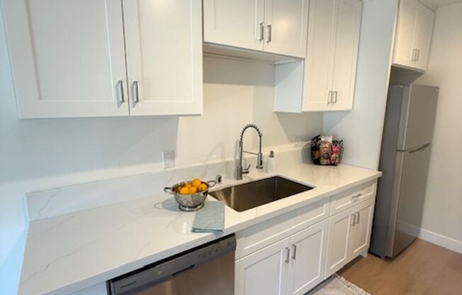Newly Remodeled - Move-in Special $$$ New a/c, Private Balcony, Washer/Dryer in unit, New Kitchen & Bath