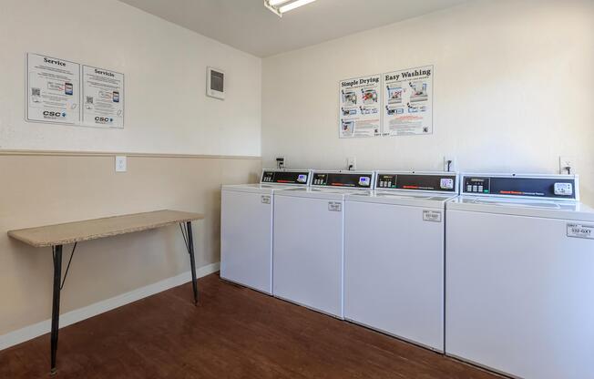 a white refrigerator freezer sitting in a room