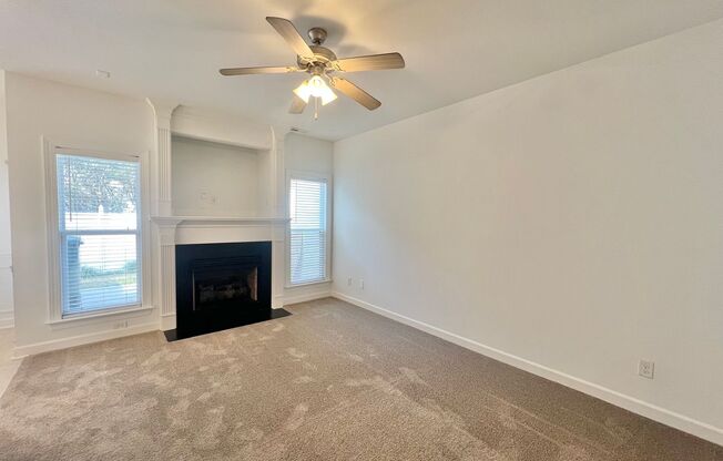 Charming 3BD, 2.5BA End Unit Raleigh Townhome with a Patio and Fenced Yard in an HOA Community, with Easy Access to I-540