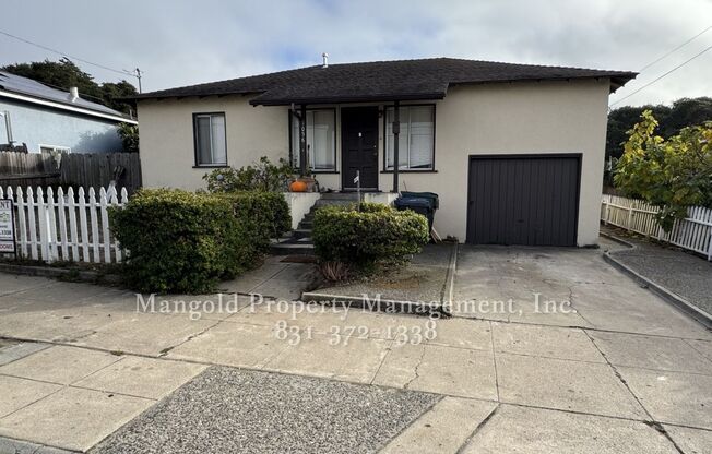 Charming 2-Bed 1-Bath Home in Seaside with Large Fenced Back Yard and Attached Garage