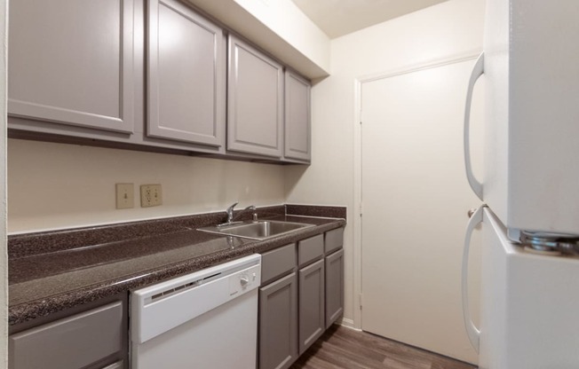 This is a photo the kitchen of the 940 square foot, Sycamore 2 bedroom, 1 bath apartment at Montana Valley Apartments in the Westwood neighborhood of Cincinnati, OH.