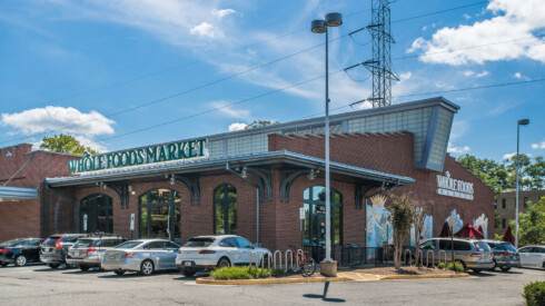 a building with cars parked in front of it