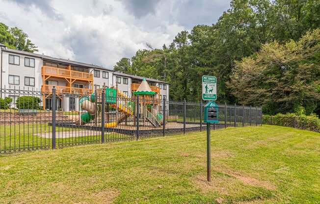 Fenced in playground at Pinewood Townhomes, Tucker, GA, 30084