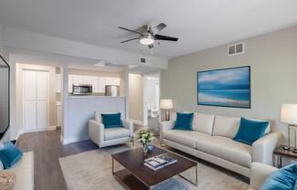 a living room with couches and a coffee table