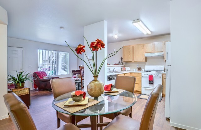 Apartments in North Las Vegas NV - Portola Del Sol - Dining Room with White Walls Connected to Kitchen