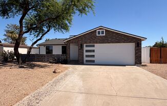 Updated 3 Bed / 2Bath Northeast Phoenix Home Ready for Immediate Move In w/ NO Carpet!