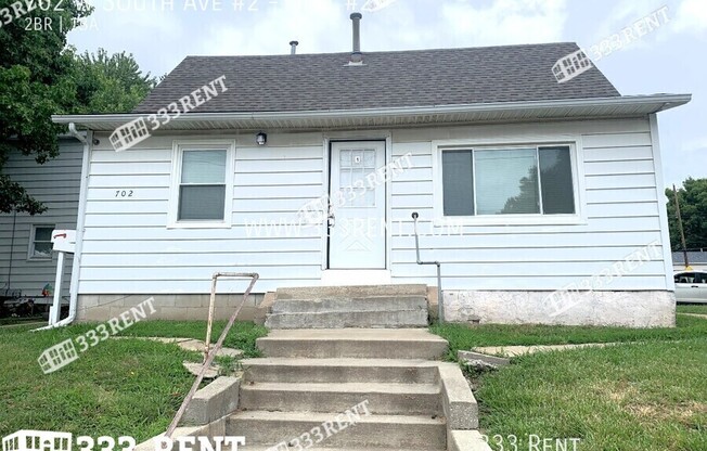 702 W S AVE