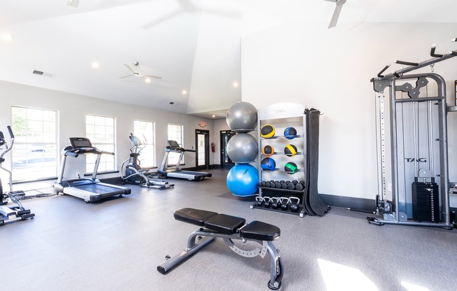 24-Hour fitness center with high ceilings at apartments for rent in Durham, North Carolina