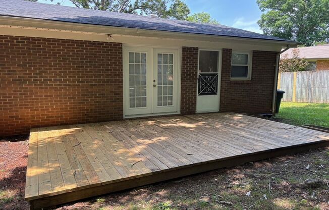 Nice brick home, single carport, storage building, 3 bdrm 1.5 ba