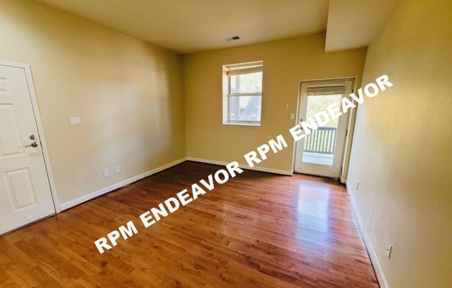 "Charming 2-Bed Condo with Bay Window & Gated Parking Near Wash U!