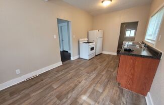 Two bedroom home with partially fenced yard!