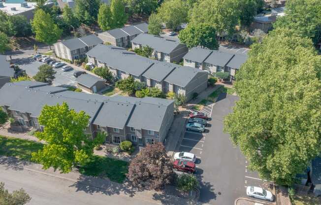 arial view of a neighborhood of houses with gray roofs