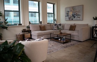 a living room with a couch and a table