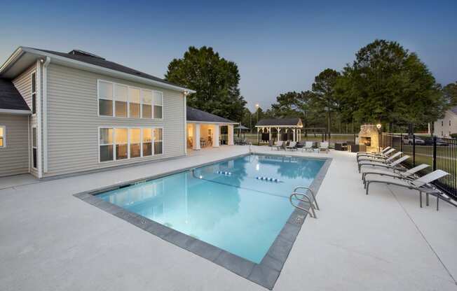 the swimming pool at our apartments at dusk