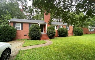 7506 WOODLEY RD