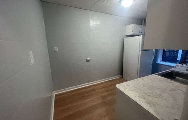 1111-Trefoil Manor, LLC