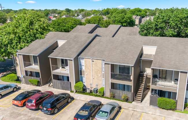 an aerial view of residential buildings at Kirkwood Landing Apartments in Houston