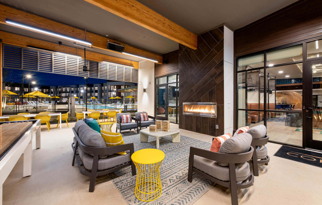 Corsair Apartments Patio Seating with Fireplace