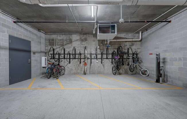 the bike rack in the garage of the building