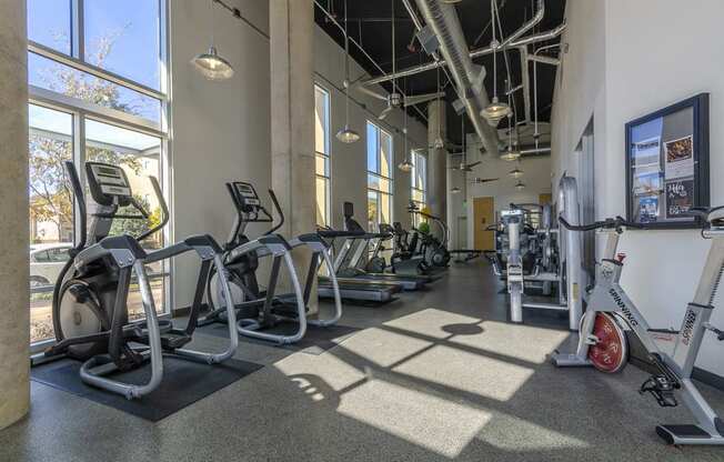 the gym atrium at the district flats apartments in lenexa