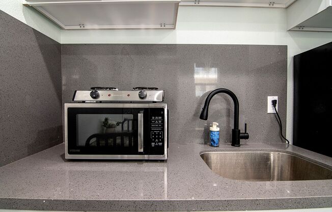 Studio, 1 bath, 141 sqft, $1,077.08, Unit 03
