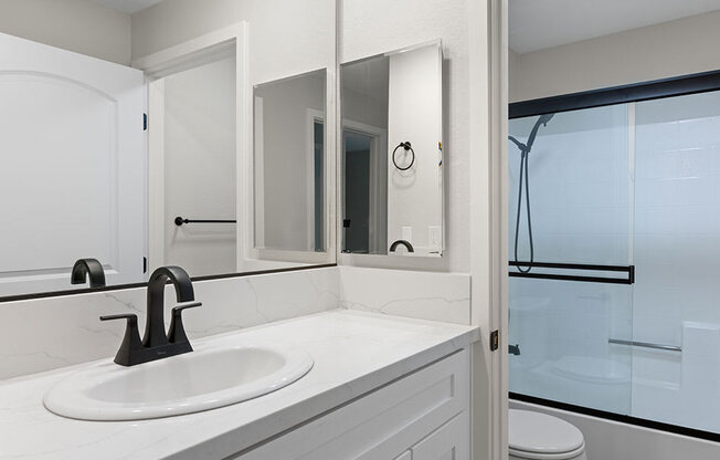 Modern styled bathroom with shower and tub.