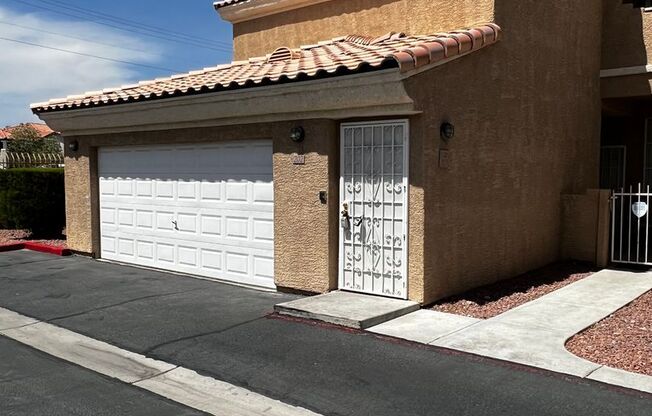 Charming Condo with Private Two-Car Garage in a Gated Community