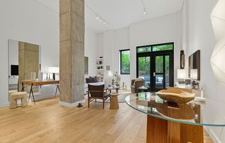 Elevated Urban Living in this Designer Remodeled Main Floor Corner Unit at the Park Place Condominiums in the Pearl!