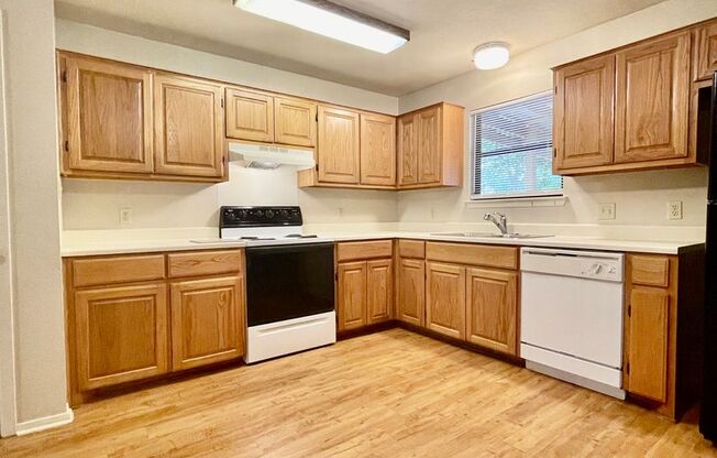 Eclectic 3 Bedroom, 2 Bathroom Home - 2 Car Garage - Fenced Yard and More!