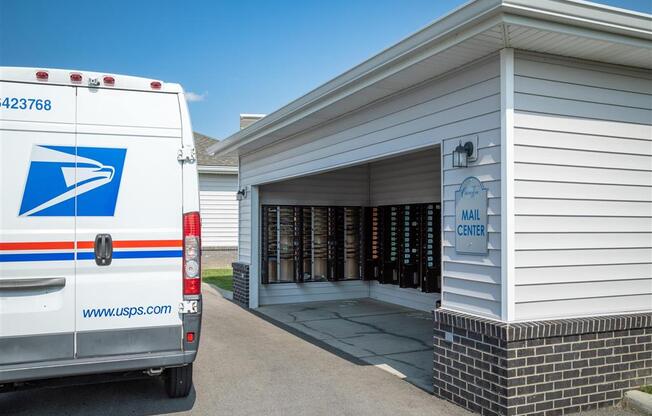 an parked in front of a building