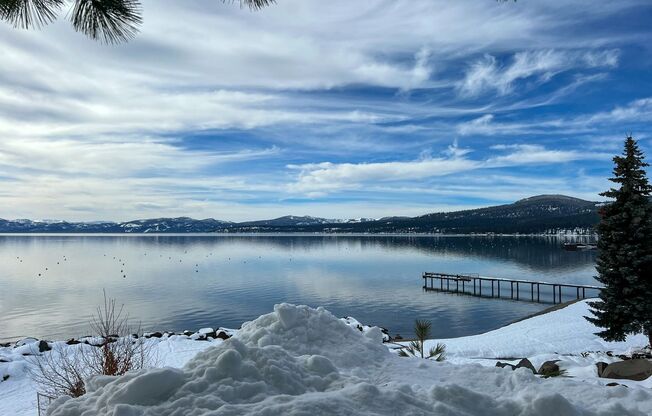 Open for winter ski lease 2025!!! FULLY FURNISHED! Simplicity in a dream location! Lake front condo, fully remodeled! Private dock and beach!