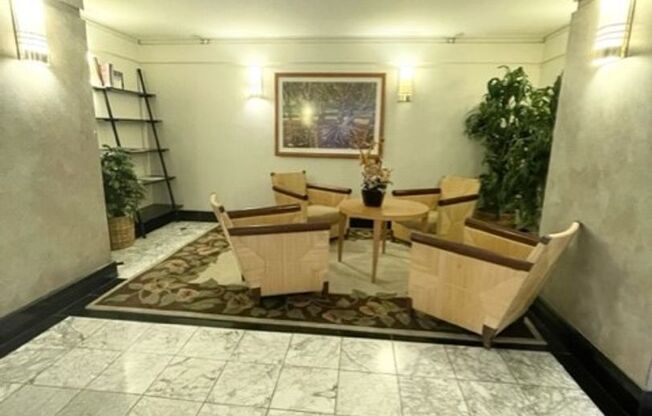 Rarely available corner end 2 bed 2 bath unit with 2 assigned parking stalls on high floor
