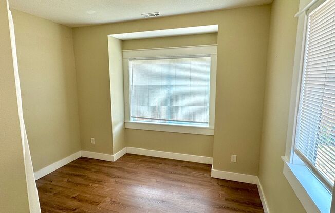 Portsmouth Neighborhood Updated 3-Story Home with Spacious Yard, Finished Basement, LVP Flooring