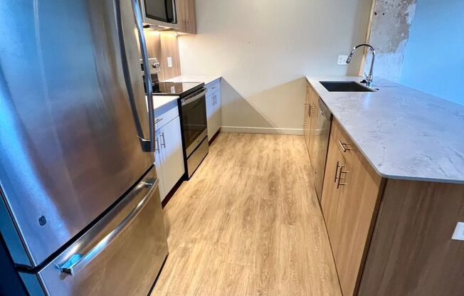 1 bed, 1 bath, 818 sqft, $1,350, Unit 103