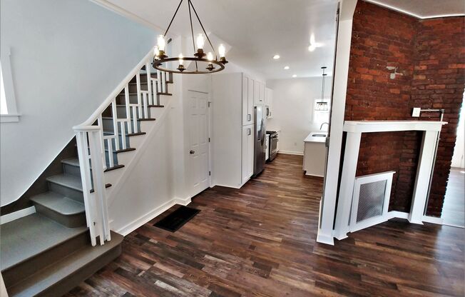 GORGEOUS, large 3 bedroom stand alone house w/ master suite, quartz, stainless, a/c, laundry, and parking!