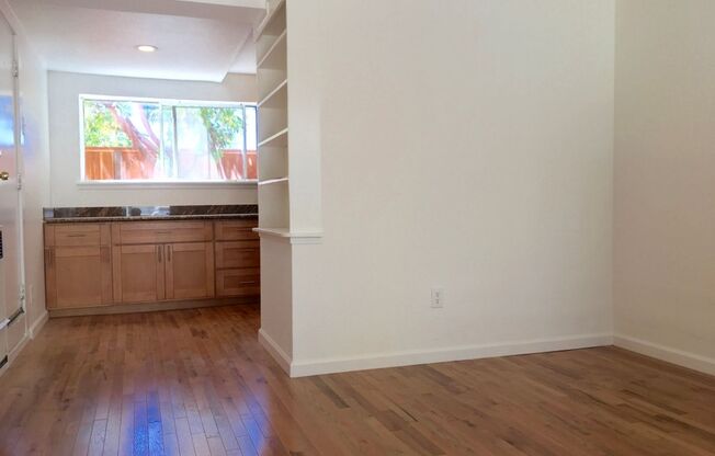 Victorian 1BD/1BATH with its own private backyard area with a sun drenched front patio.