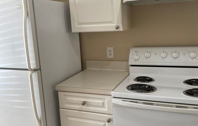 4107 Plantation Cove Dr. Quiet, cozy townhouse with view of the grounds.