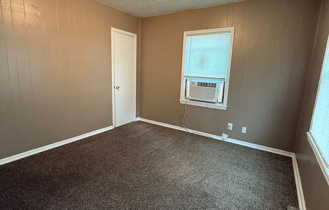 Charming 2-Bed End Unit in Quiet Quadplex- Move In Ready!