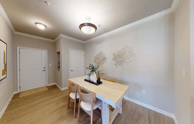 a separate dining space with a chandelier