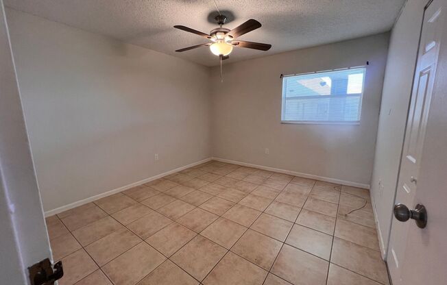 Great unit with pool view, pretty tile flooring.
