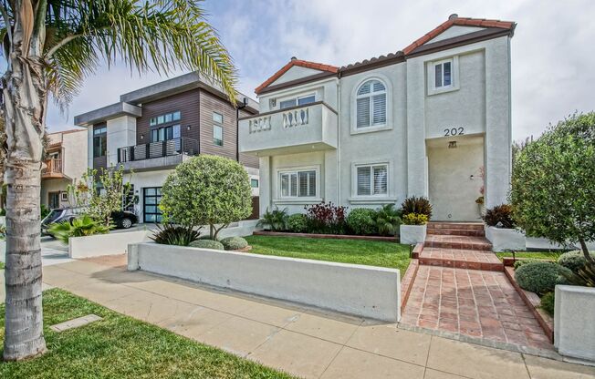 Beautifully Remodeled, Detached Front Townhome w/ Amazing Dual Open Living Spaces, Incredible Outdoor Space & 2-Car Garage Just Blocks to Schools, Shopping & 2 Mins to Beach!