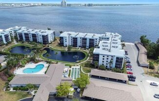 Riverfront Condo Location 1,100+ square feet HUGE 1 bedroom with oversized lanai