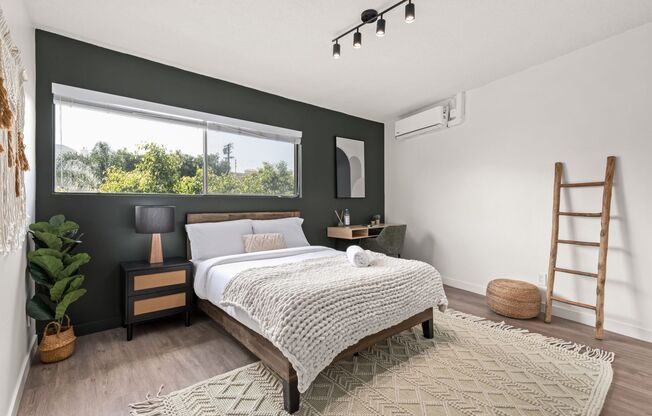 A 4 Bedroom, 2 Bathroom apartment with common areas and a fully functional kitchen at 1700 Malcolm Ave, Unit 306
