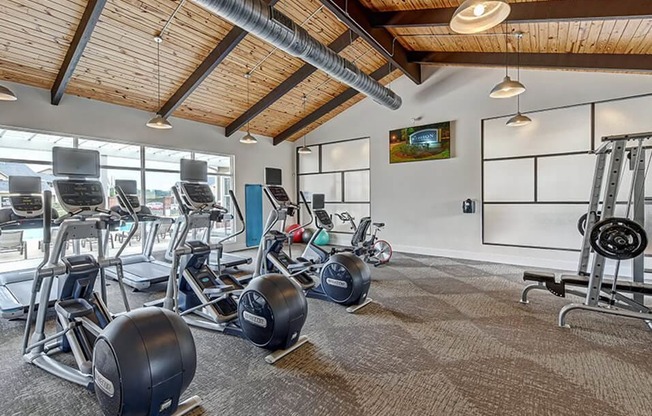 fitness center at apartment