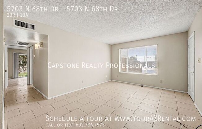 5703 N 68 DR