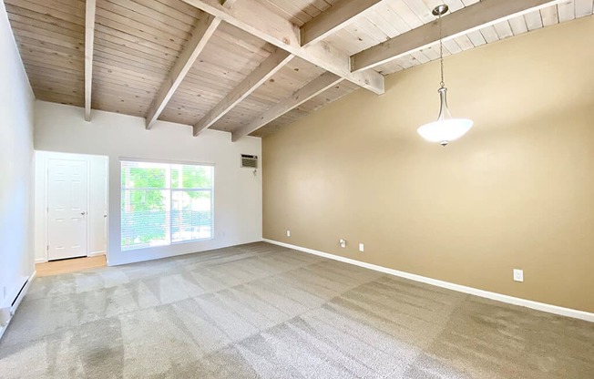 Living Room With Expansive Window at The Glens, California