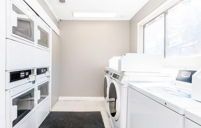 a kitchen with a sink and a window