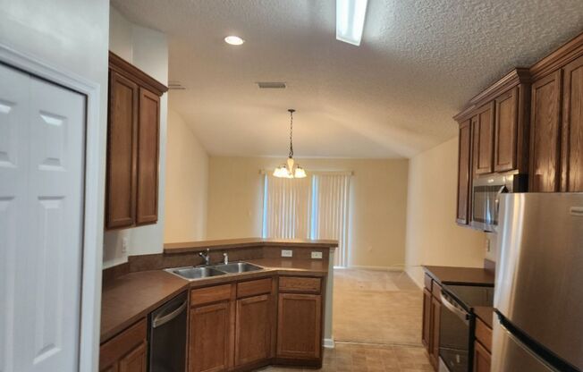 4 Bedroom 2 Bath Brick and Stucco in desirable Silver Creek