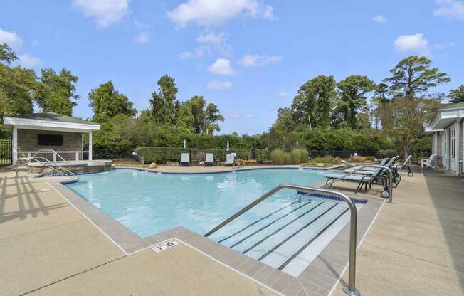 the swimming pool at the preserve at polo towers apartments